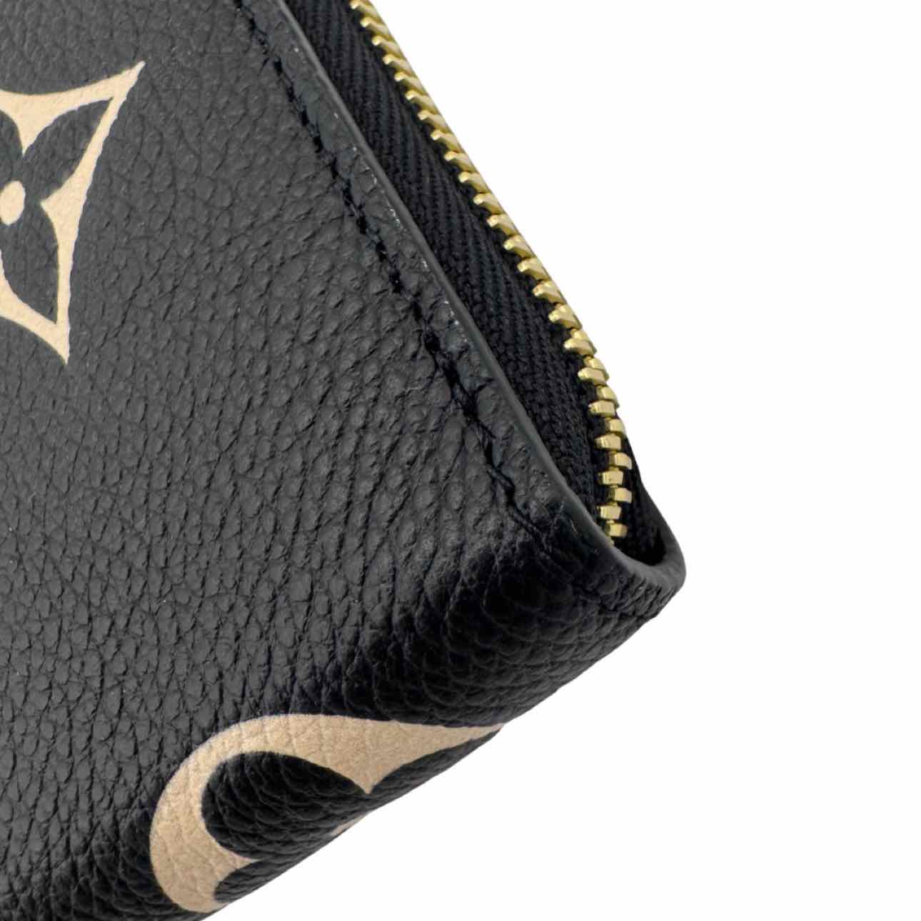LOUIS VUITTON Bicolor Monogram Empreinte Leather Clemence Wallet Black