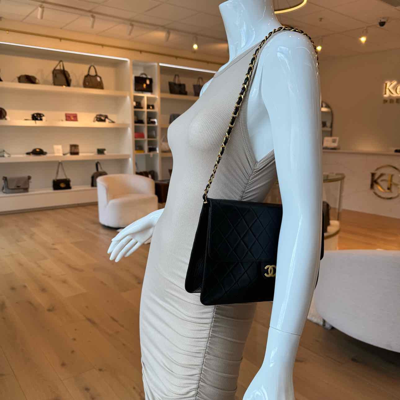 CHANEL Quilted Lambskin Push Lock Small Single Flap Back