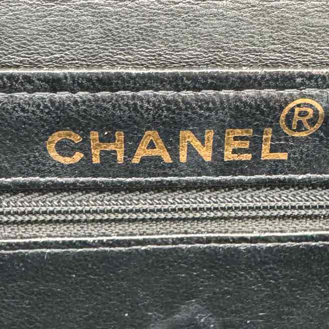 CHANEL Quilted Lambskin Double Sided Tall Flap Black