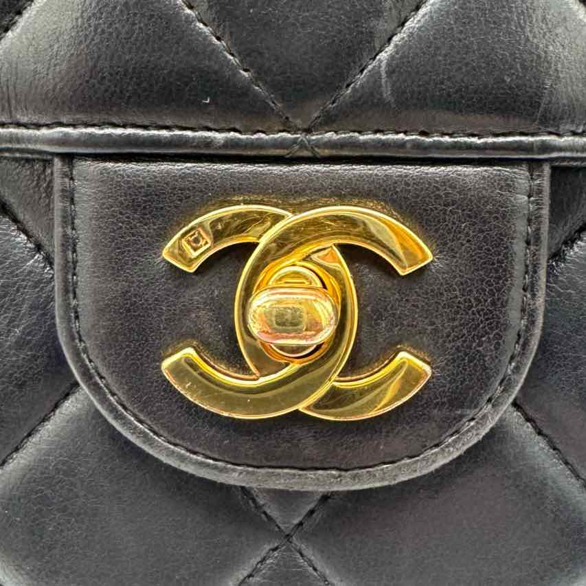CHANEL Quilted Lambskin Double Sided Tall Flap Black