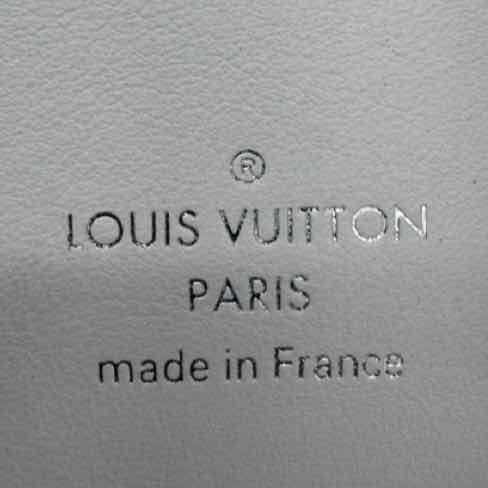 LOUIS VUITTON Taurillon Leather Capucines XS  Wallet Optical White (Pre-Owned)