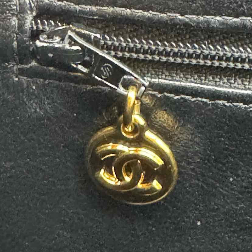 CHANEL Quilted Lambskin Double Sided Tall Flap Black